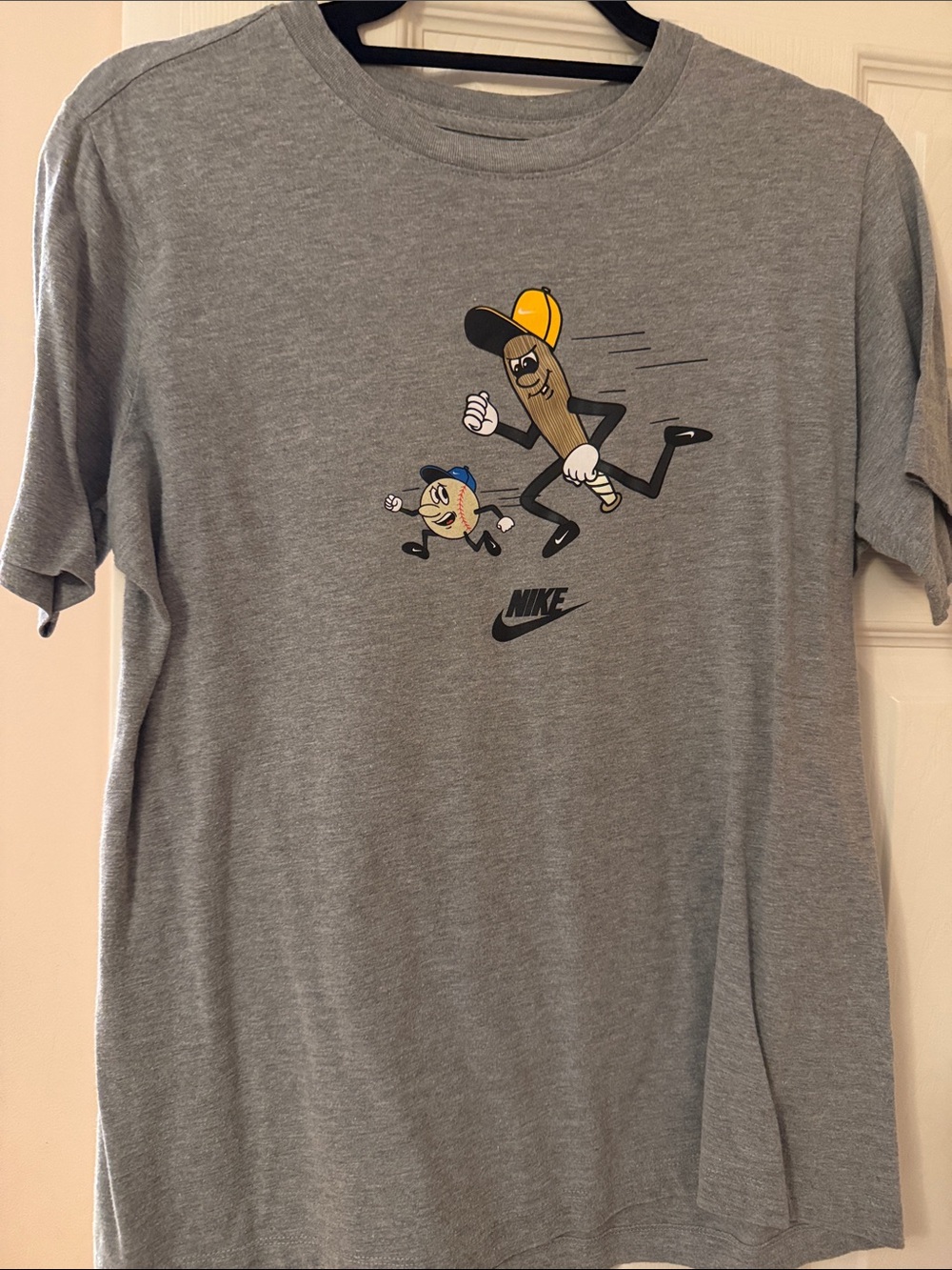Nike Gray Tee with Cartoon Running Characters and Yellow Cap